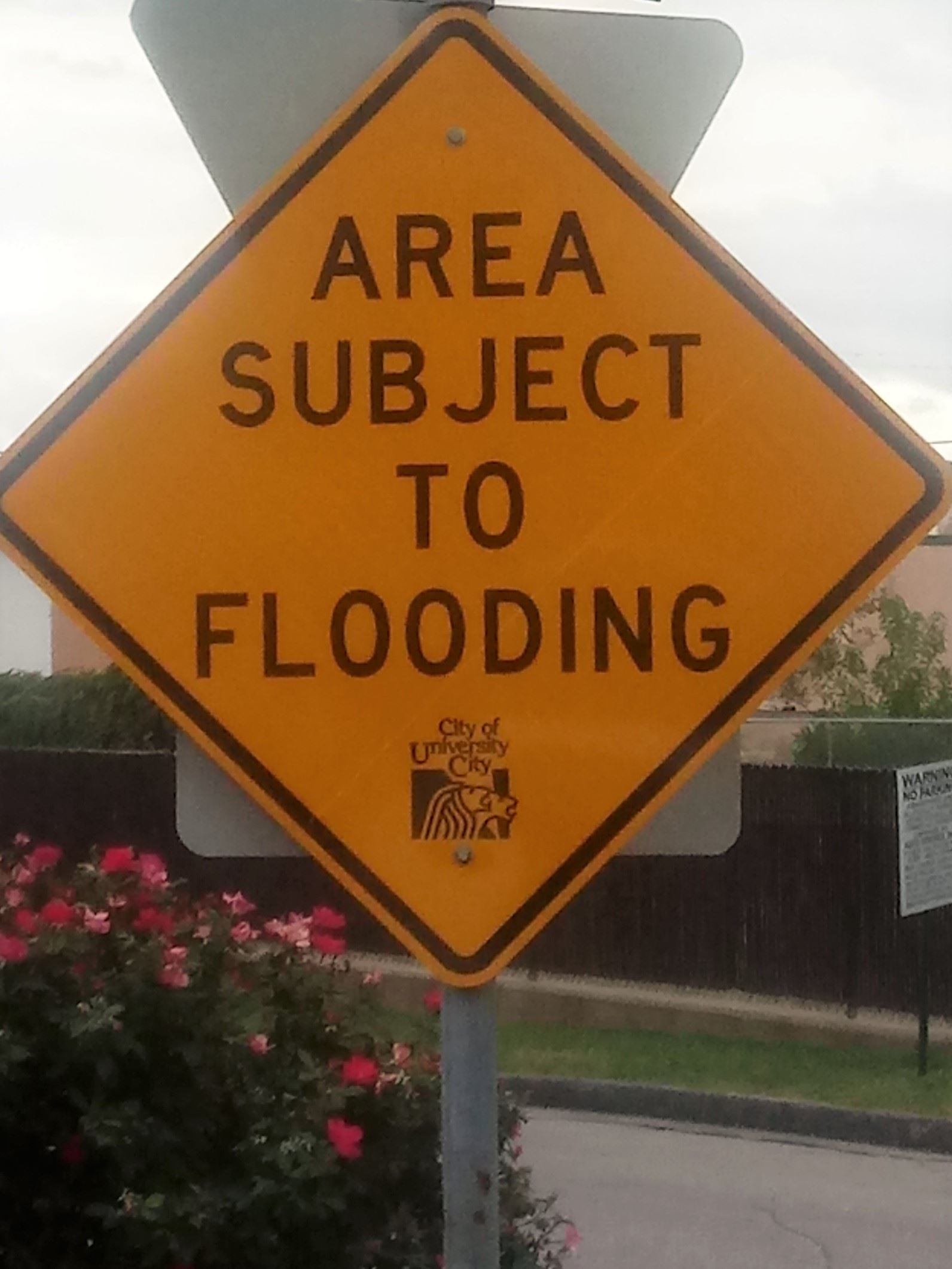 U City flood sign